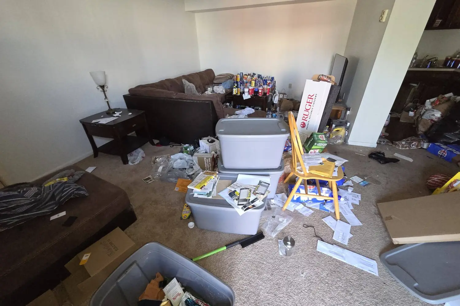 A rental apartment left full of furniture and rubbish after an eviction